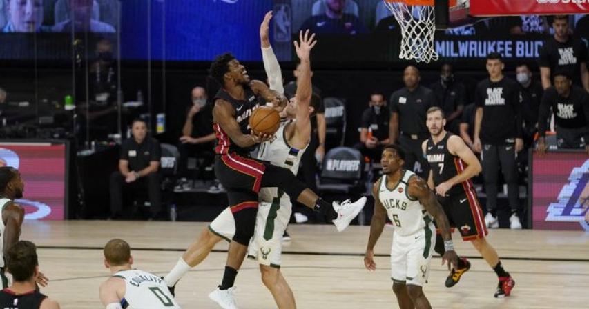 Heat oust depleted Bucks to reach NBA East finals